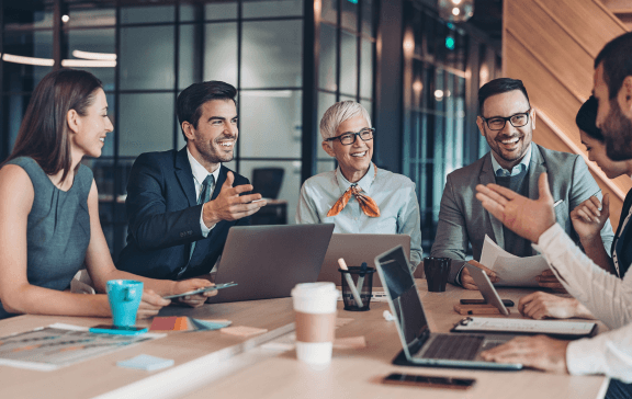 Executives reviewing decision intelligence outcomes